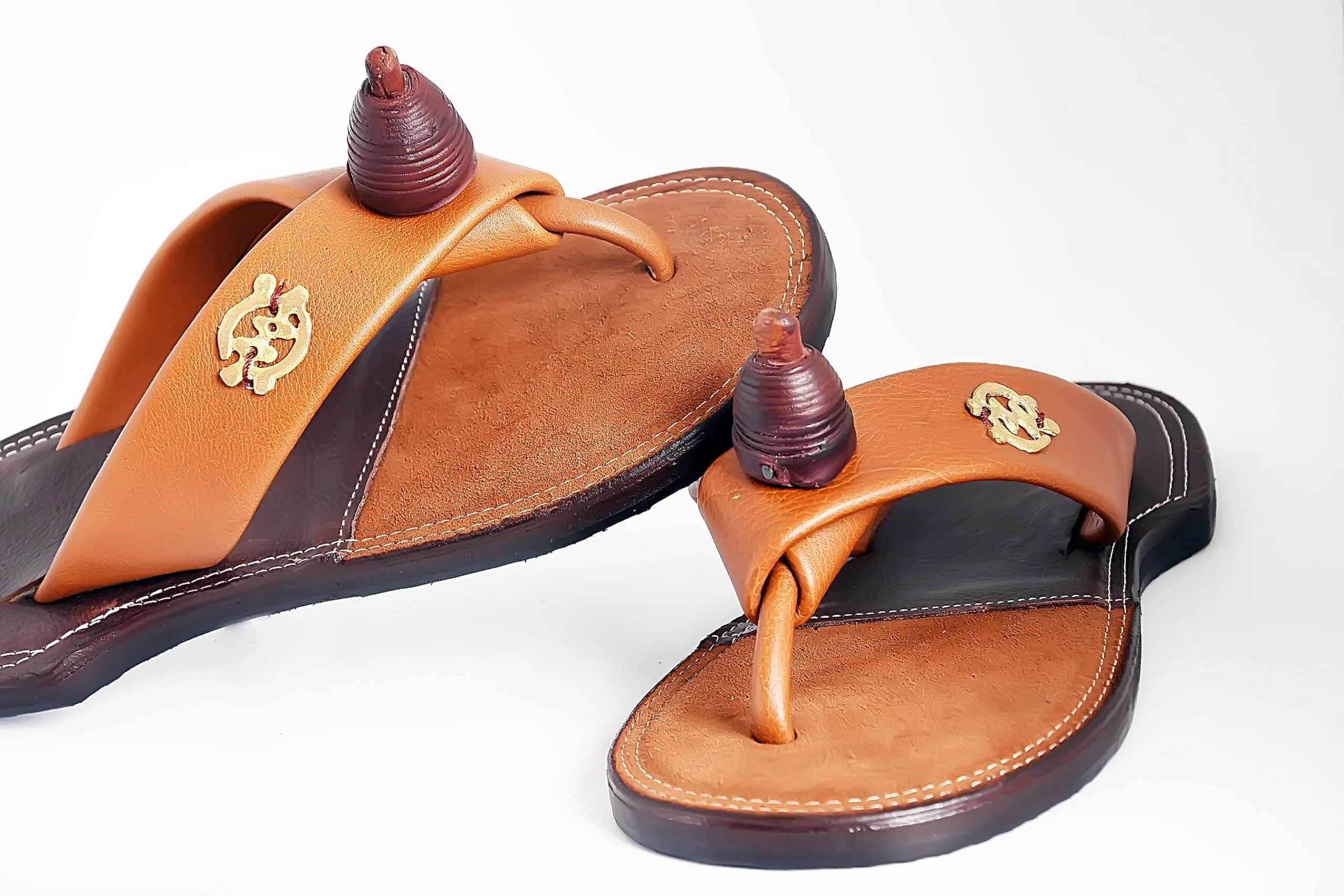 The Akan leather accent Coziest Slippers